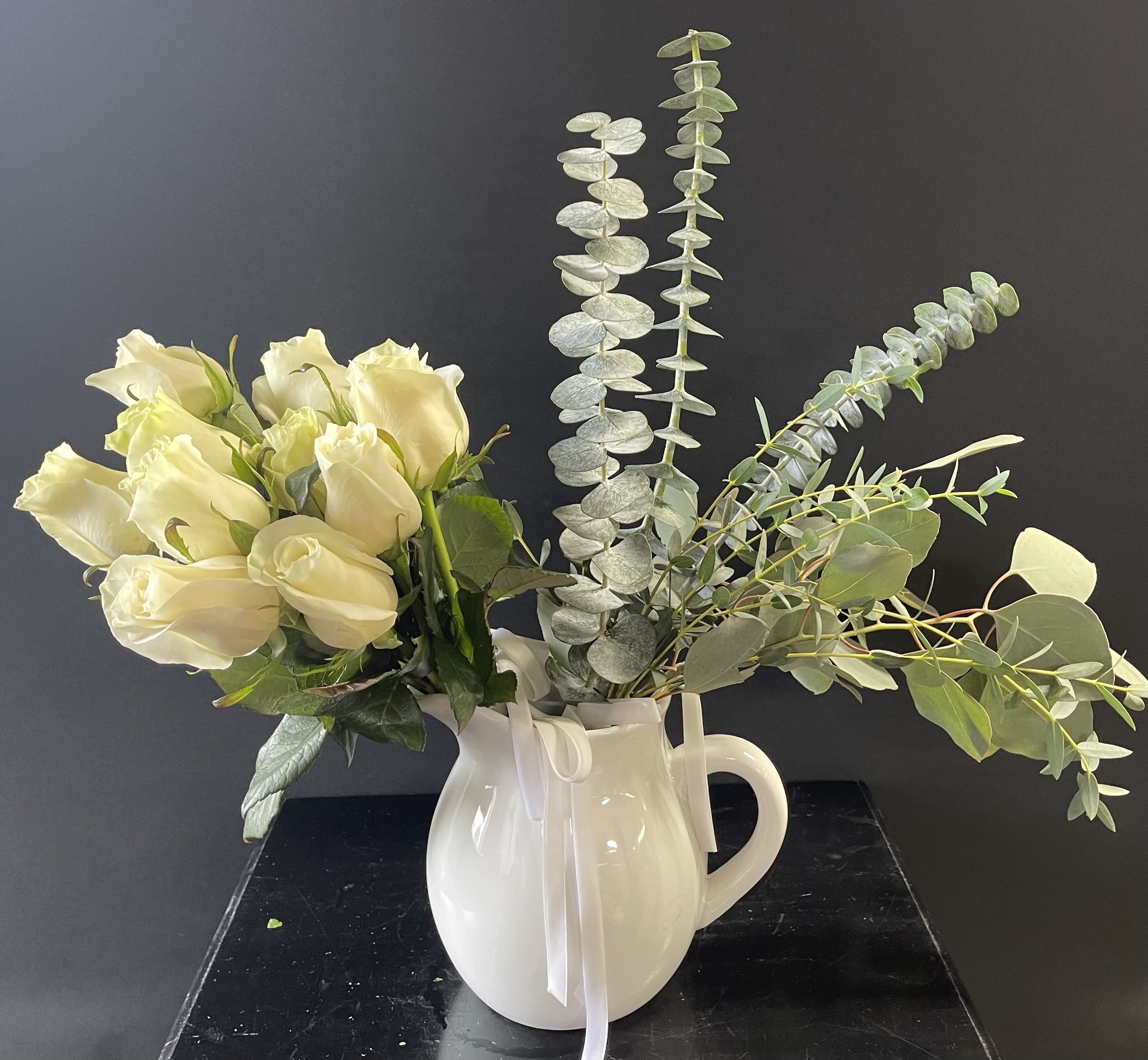 Roses from the Garden - Another way to send a dozen roses.  As if you went out to the garden with a pitcher and gathered your roses and greenery yourself.  A country farmhouse feel that is so calm and welcoming.