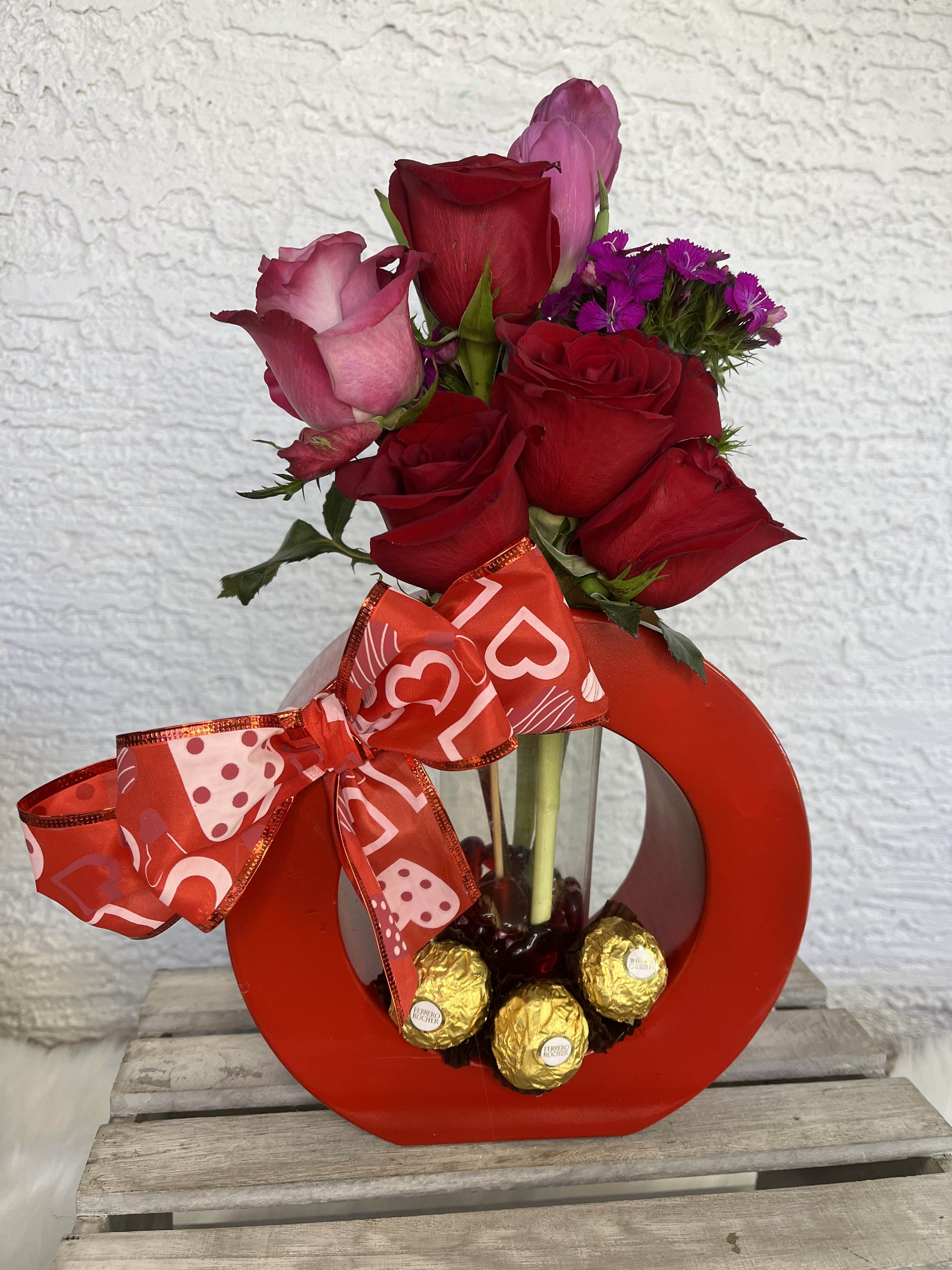 Circle of Love - red flowers are associated with feelings of true love and passion, they can also be used to convey respect.  Whit our special and unique creations we want to touch the  heart of each person who receives one of our arrangements. We have put all our and love into each and every one of the creations. You are our inspiration.