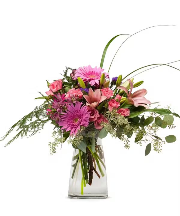 SURPRISE SURPRISE - This cheeky pink mix of fabulous fresh flowers is a perfect gift for a loved one, friend, family member, boss, or just someone you want to send flowers too. Joyful and sassy Gerbera Daisies surrounded by Roses, Lilies and lively green foliage.