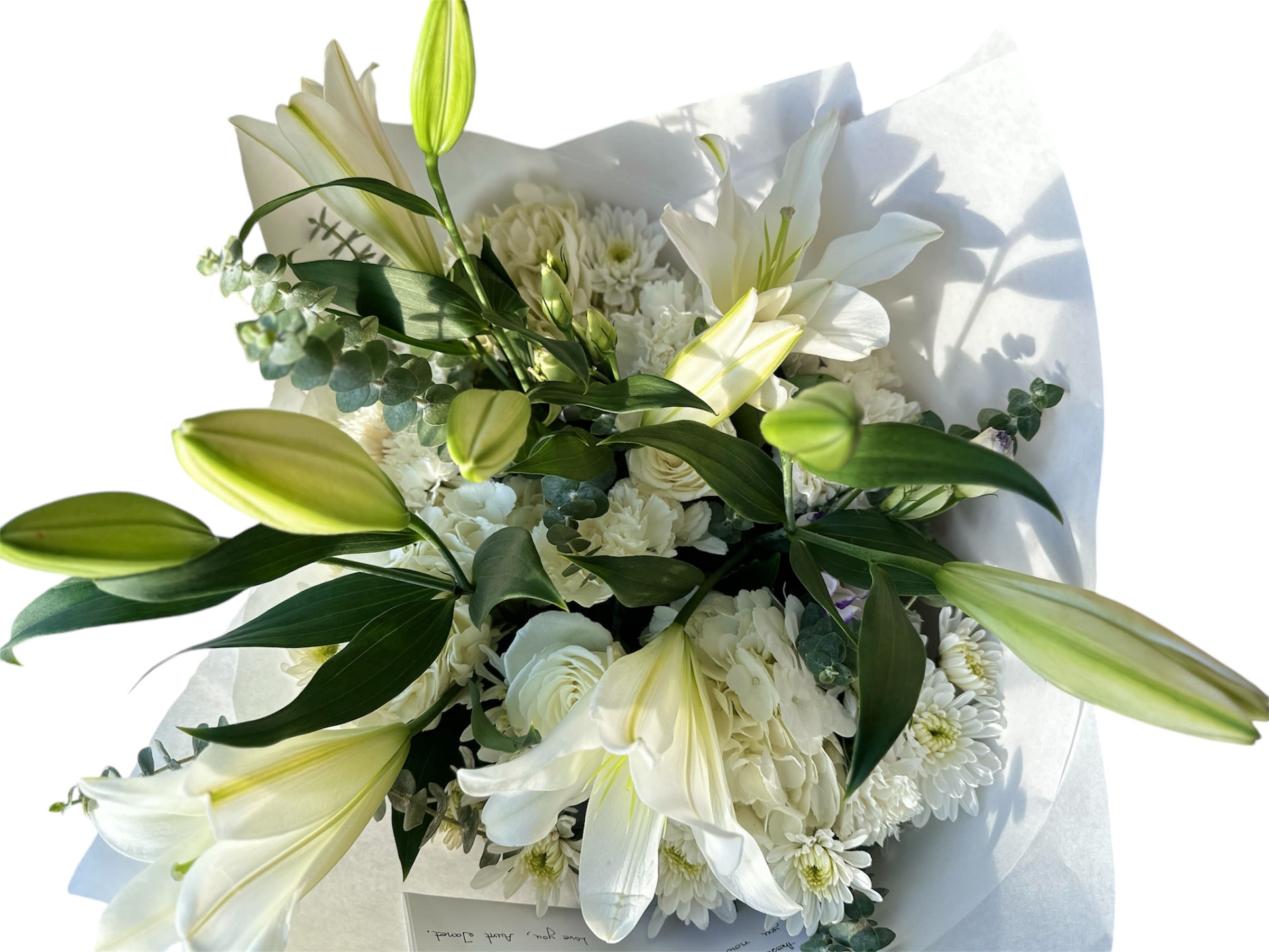 Blessings  - This arrangement is made with white flowers and contains a variety.