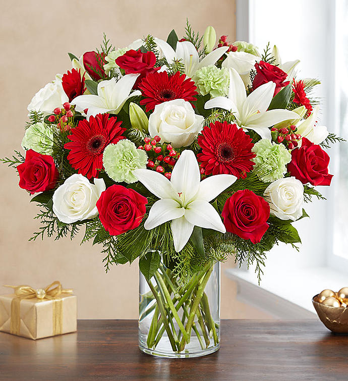 Holiday Garden of Grandeur Holiday Garden of Grandeur - Large festive arrangement of red and white roses, white lilies, green carnations gerbera daisies and evergreens
