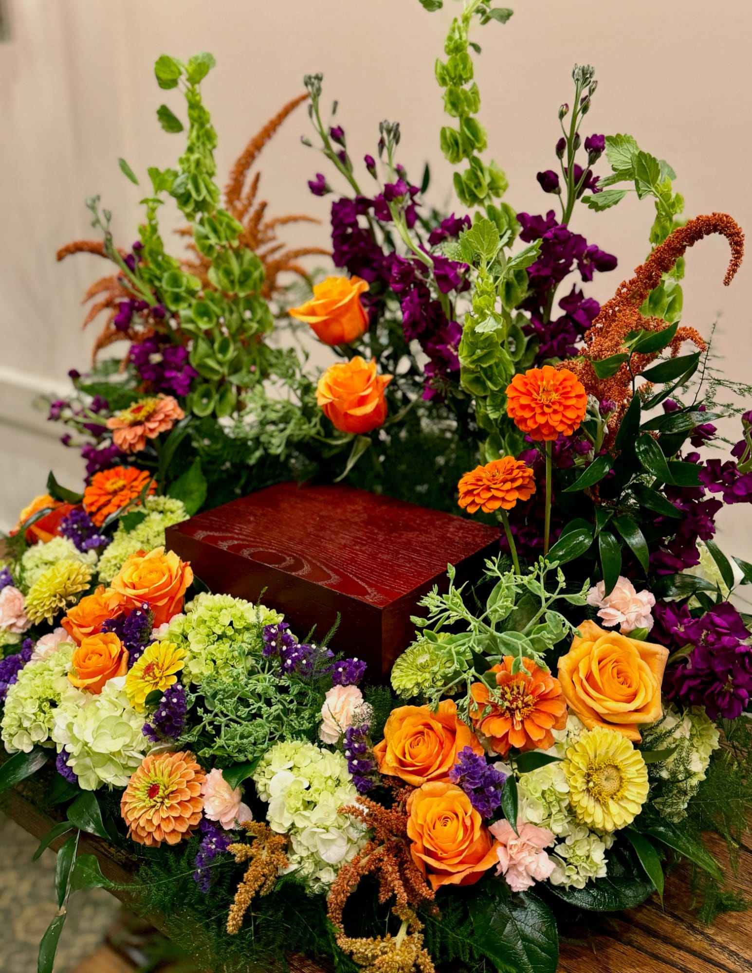 Celebration of Life Urn Piece Celebration of Life Urn Piece - A heartfelt arrangement featuring bright, vibrant blooms, offering a loving tribute to a life filled with light and joy