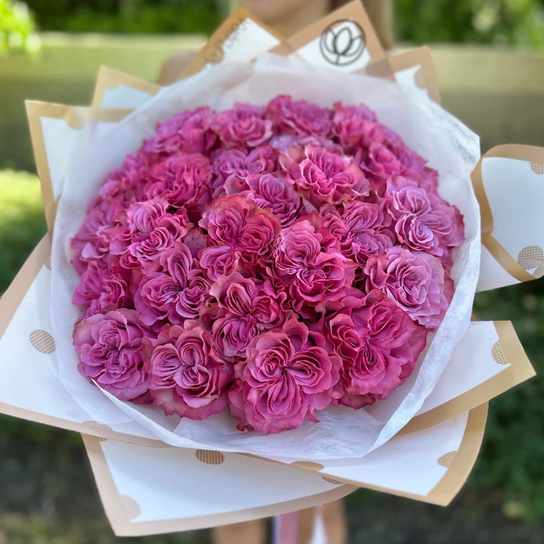 Bouquet of purple roses - Bouquet of pretty purple roses in a wrap. Standard- 25 roses Deluxe - 50 roses Premium - 75 roses