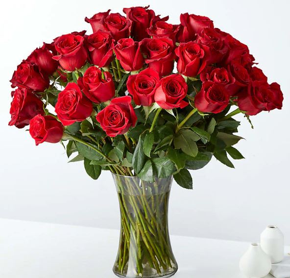 Exquisite Long Stem Red Rose Bouquet - 50 long stem red rose bouquet.  Perfect for Birthday, Anniversary, or any type of special celebration.