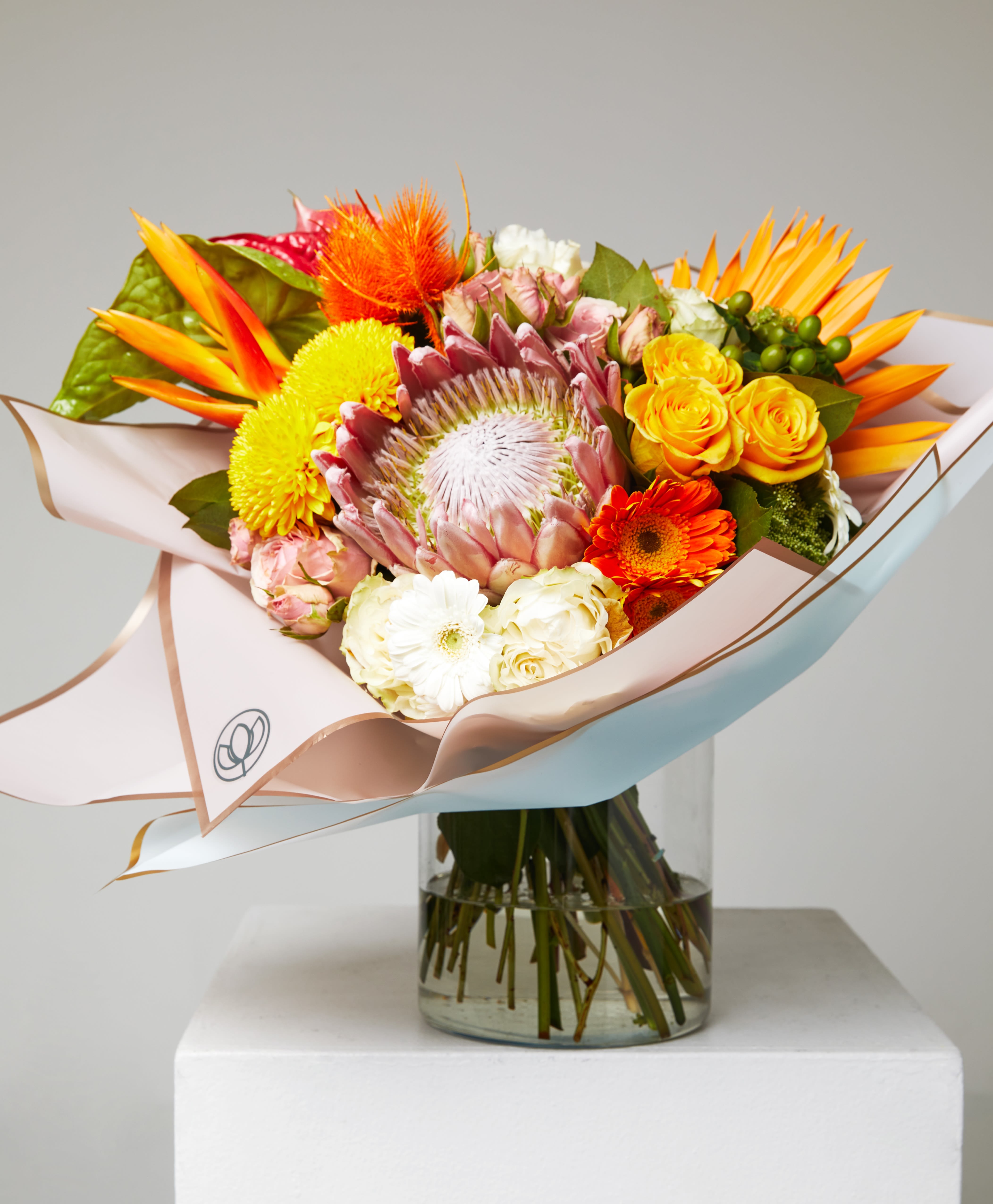 Large Exotic Bouquet - Tropical and exotic flower bouquet with King protea, roses, laceleafs and transvaal daisy. 