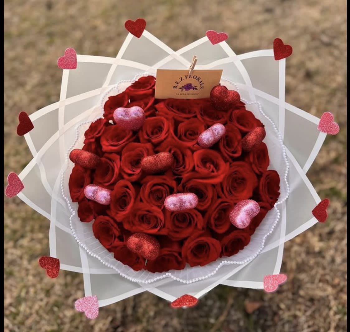 My whole heart belongs to you - 50 Red Roses adorned with hearts and elegantly wrapped with white tissue 