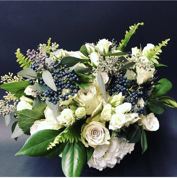 Garbo Garbo - *This is available for next day delivery. Roses, mixed greenery, hydrangea, berries, seeded eucalyptus, garden spray roses. *We always use the freshest flowers available. Seasonal substitutions may be made, but the overall feel of the arrangement will stay the same.