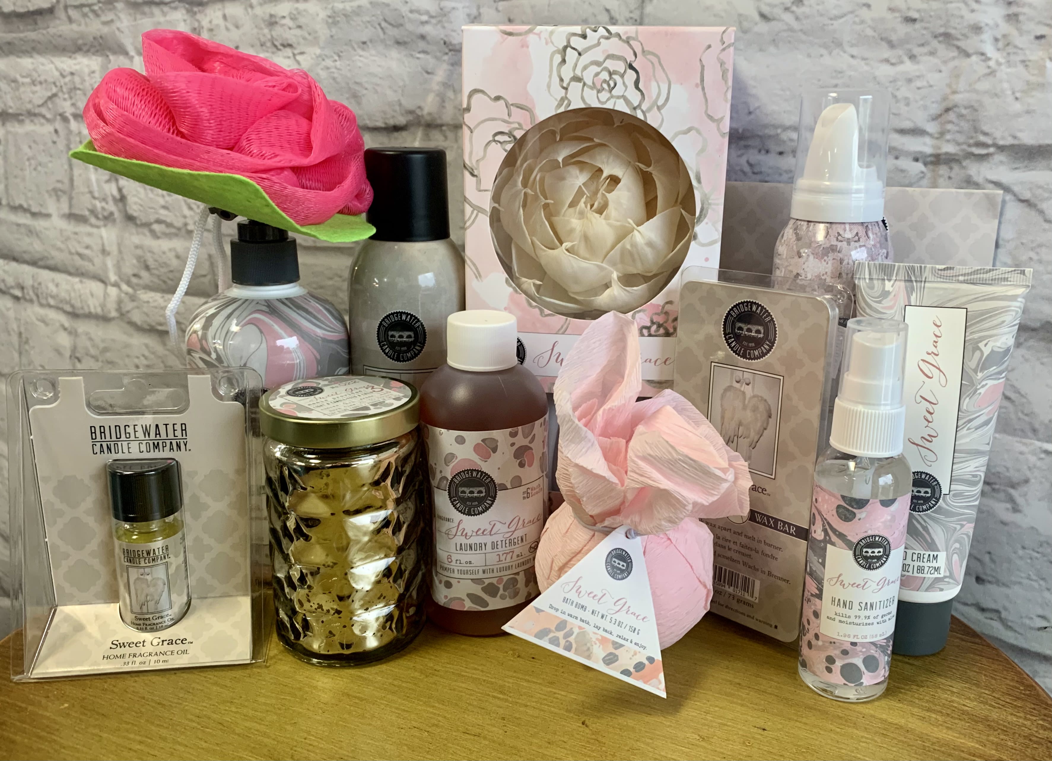Graced one Graced one - This plentiful gift set includes a variety of Sweet Grace fragranced home and body products. Each one hand picked and dressed for your specific occasion. Picture represents the variety of products available for example.