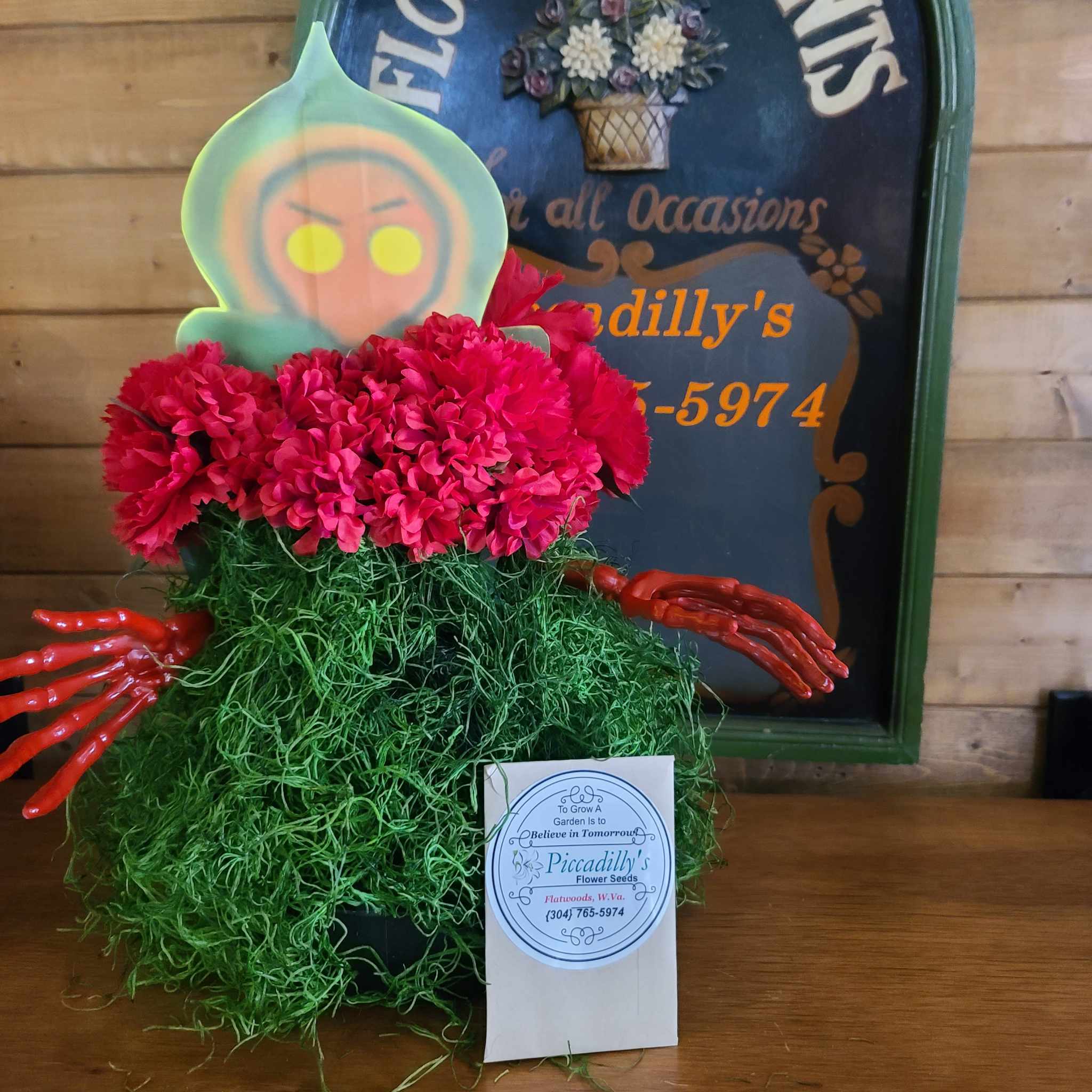 Flatwoods Monster Flatwoods Monster - A floral arrangement of our local Folklore "The Flatwoods Green Monster" of flatwoods WV