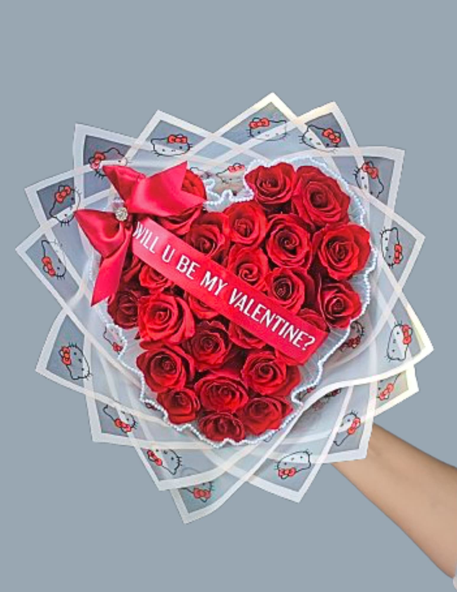 I Heart Hello Kitty  - 25 red roses specially wrapped with hello Kitty paper. Shaped like a heart and topped with a red ribbon and bow. 