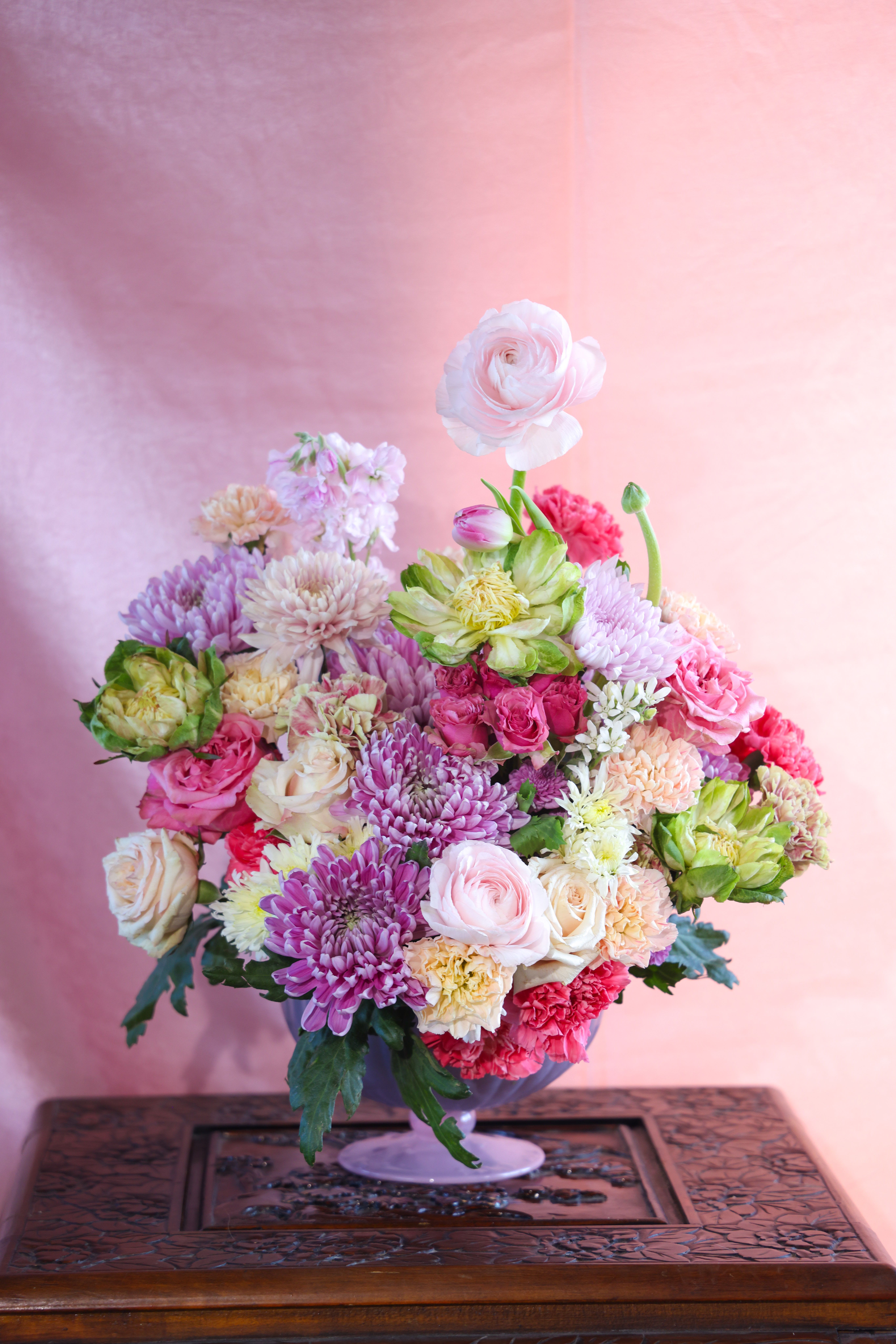 The Floating on a Cloud Arrangement - The Floating on a Cloud arrangement embodies that feeling of Joy love brings. When you know your special someone is forever held in your heart. Show her in flowers the joy she brings with this floral darling.  Custom, one of a kind floral arrangements by floral artist Stacy Leafsong. Arrangement shown is a premium.   Photos provide examples, and each arrangement &amp; vase is unique.  Arrangements will be delivered before 7pm, for specific delivery time please include in special instructions. On holidays, our busiest times, deliveries will be made by 7:30pm.