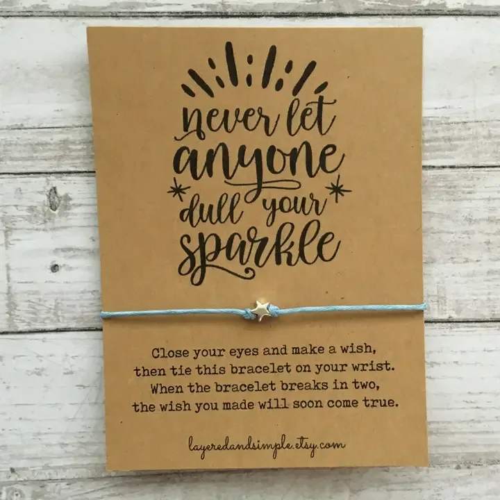 NEVER LET ANYONE DULL YOUR SPARKLE NEVER LET ANYONE DULL YOUR SPARKLE - Never Let Anyone Dull Your Sparkle Bracelet by Layered and Simple Close your Eyes and make a wish, then tie this bracelet on your wrist. When the bracelet breaks in two, the wish you made will soon come true.