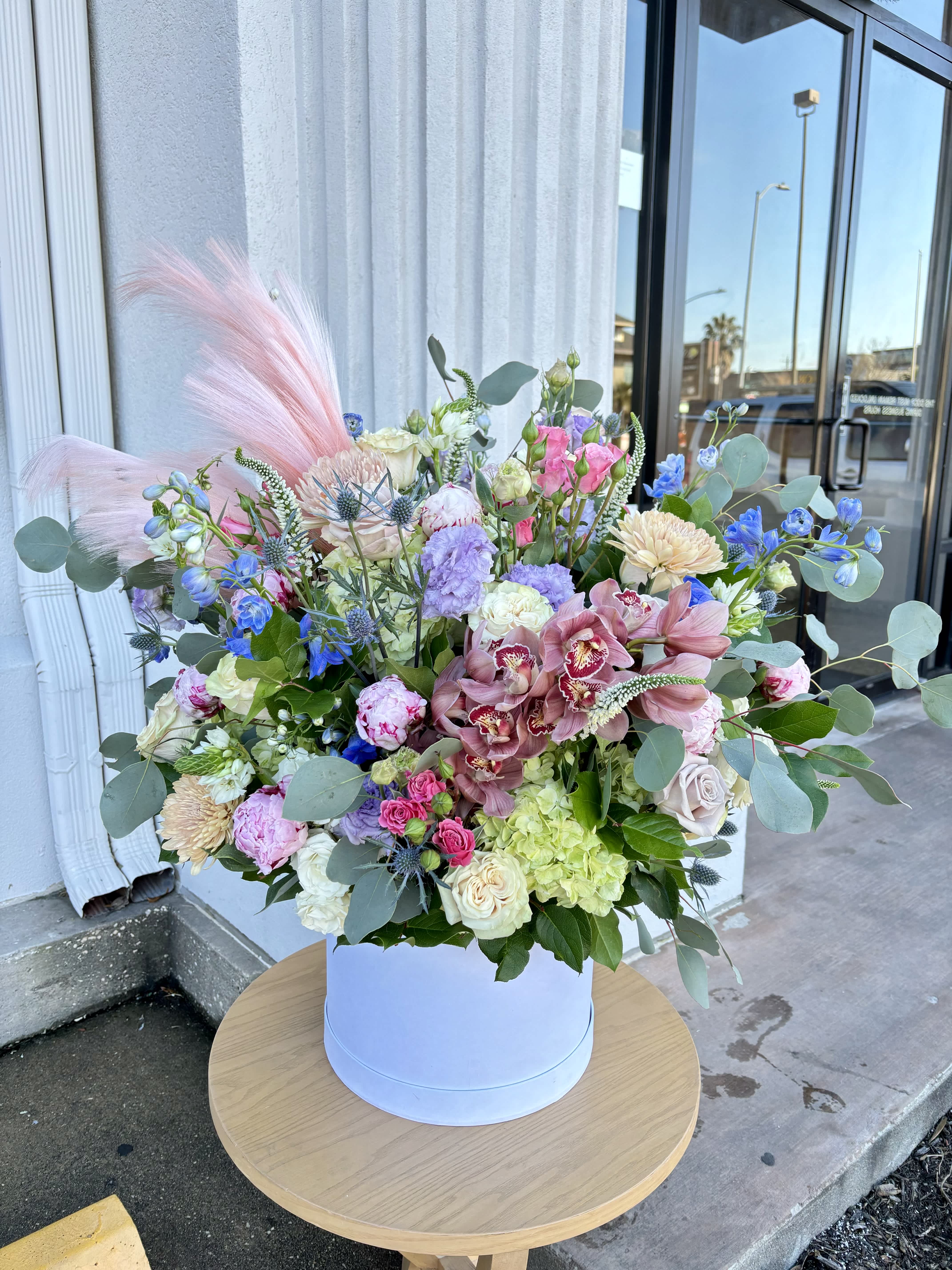 Extravagant  - A large arrangement that sits 3ft tall with assortment of flowers 