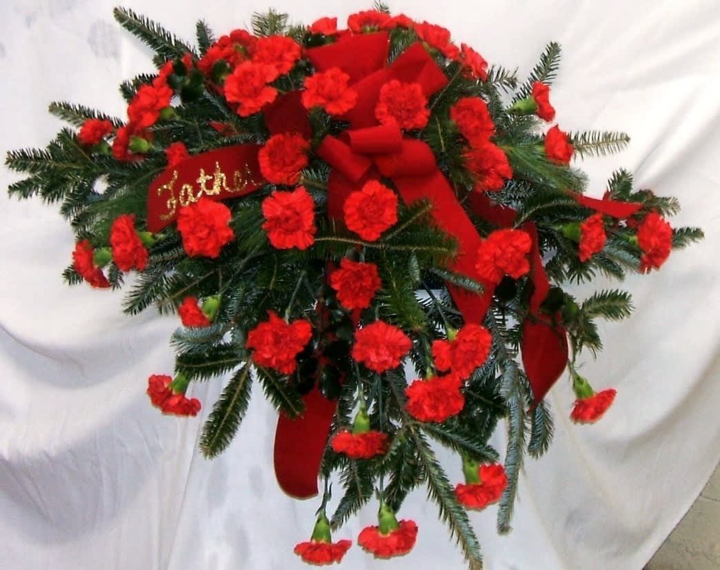 Half Couch - $150.00 Half couch designed with 4 dozen red carnations.  $185..00 same as above but includes baby's breath. 