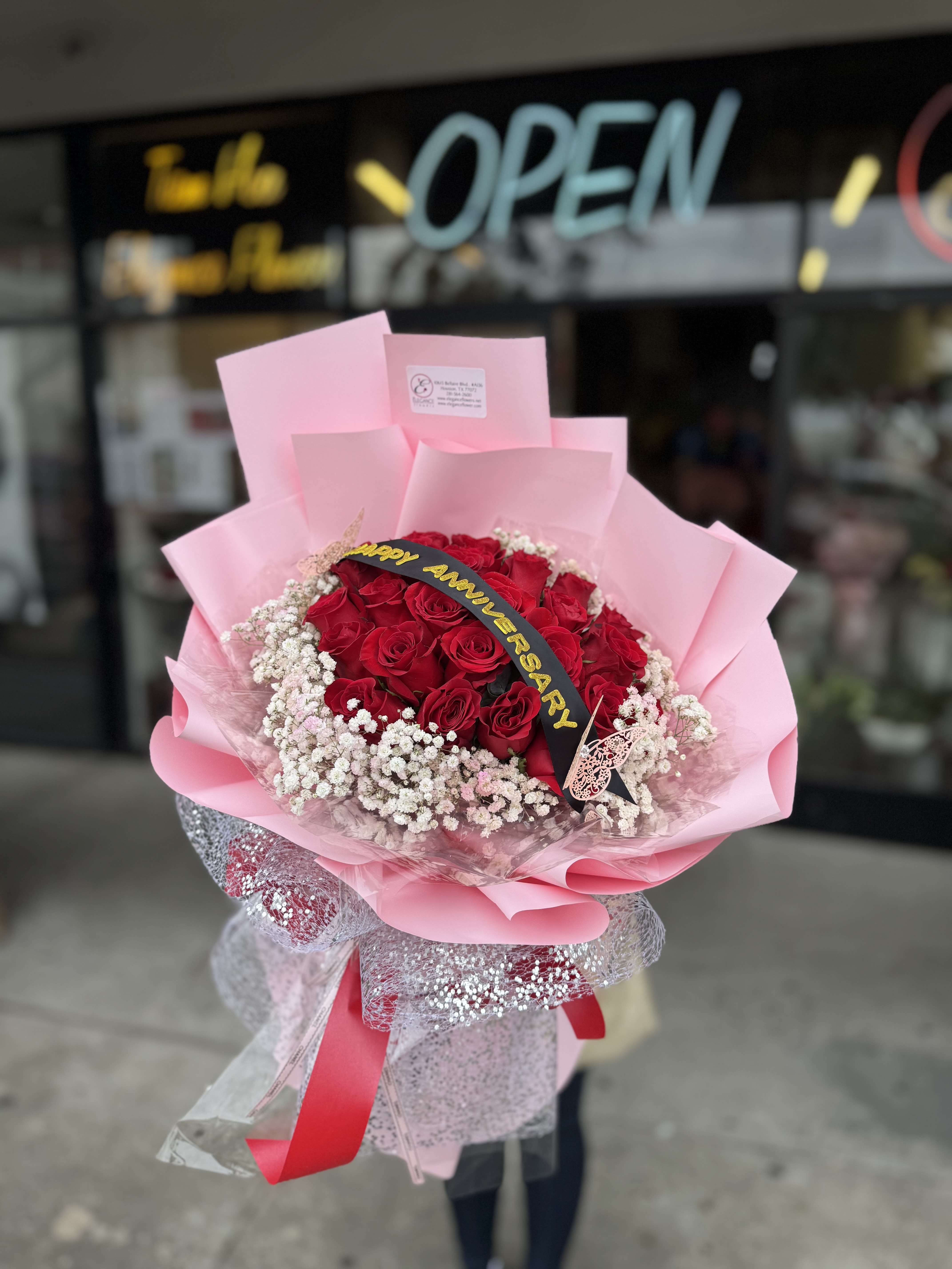 Wrapped Bouquet #22 Wrapped Bouquet #22 - Call any changes to banner! 281-564-2600 A wrapped bouquet of flowers is a beautifully arranged collection of blooms, carefully selected and elegantly wrapped in decorative paper or fabric. These bouquets often feature a mix of fresh, vibrant flowers, complemented by lush greenery, and are tied together with a ribbon or twine. Wrapped bouquets are perfect for any occasion, from expressing love and gratitude to celebrating special moments, offering a thoughtful and visually stunning gift.