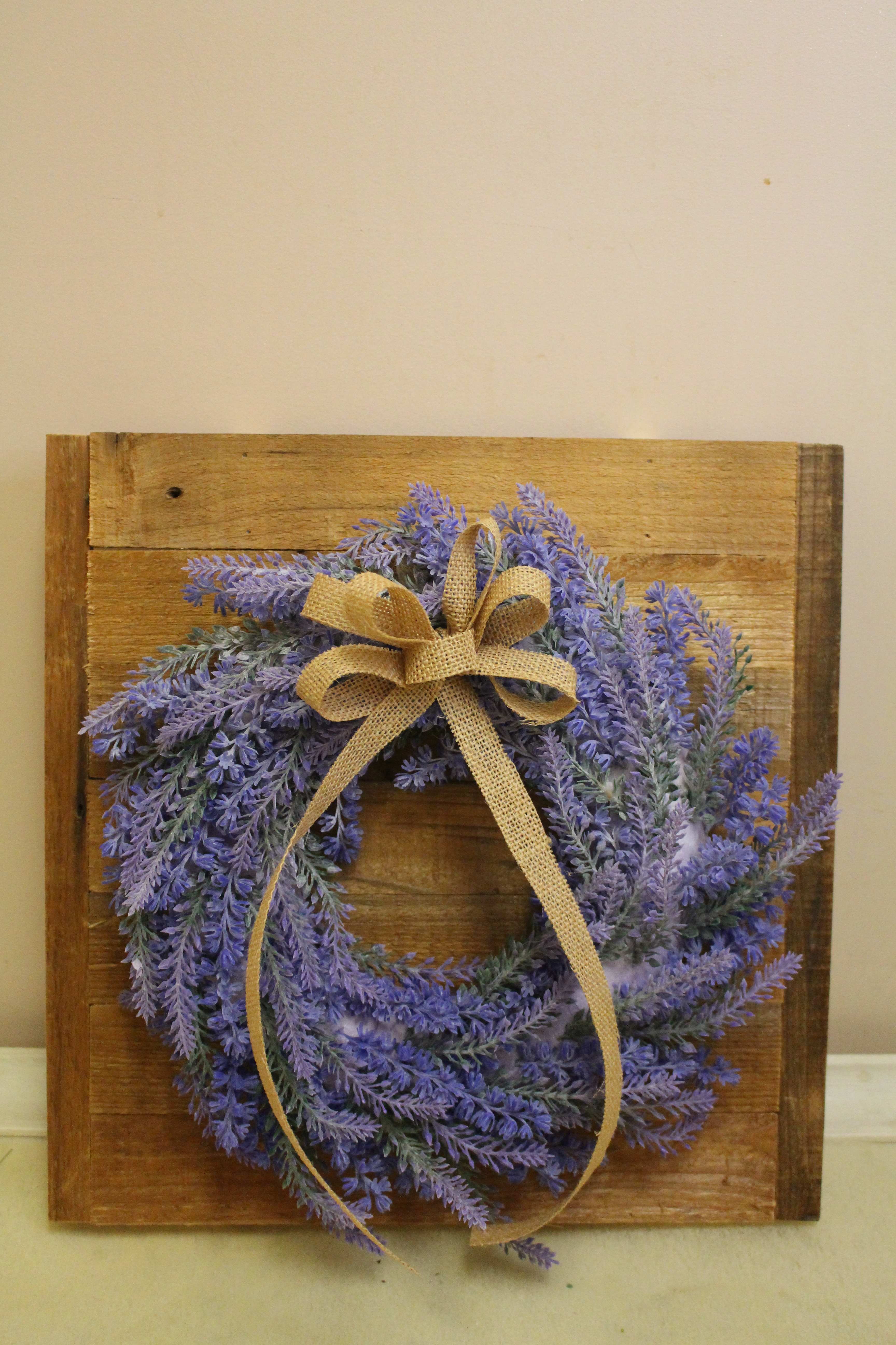 wooden lavender wreath - On a wooden blocks sits a permanent lavender wreath.  13.5 x 14.5