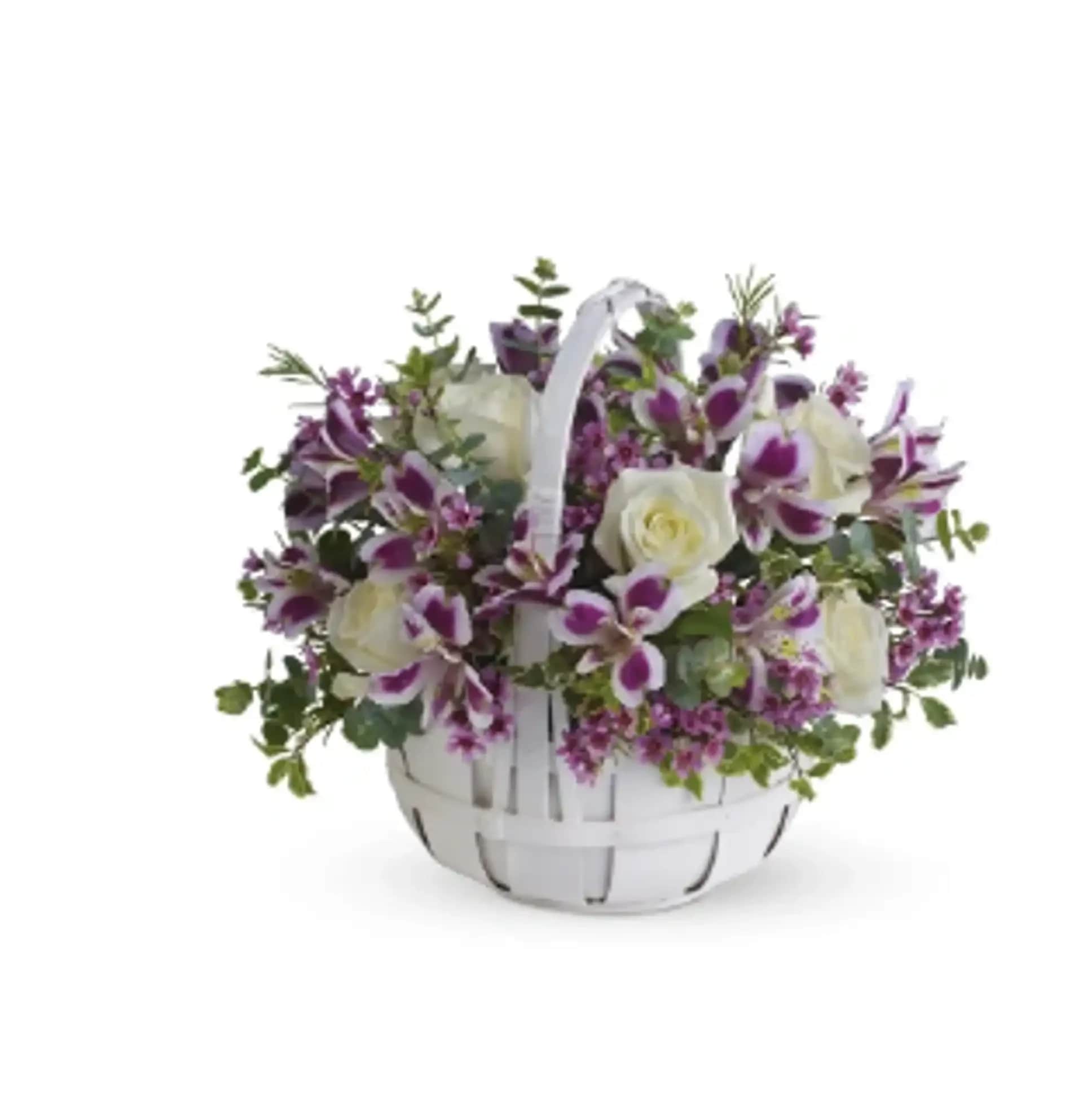 Sweet Moments Sweet Moments - Sweet Moments" is a delightful flower arrangement, artfully presented in a charming white wicker basket. This arrangement features a lovely combination of white roses, purple alstroemeria, delicate lavender waxflower, spiral eucalyptus, and pitta negra. It's a perfect way to celebrate a special moment with elegance and grace. Share the sweetness of "Sweet Moments" and make the day truly memorable. Vase may vary and reasonable flower substitutions may be required due to seasonal availability.