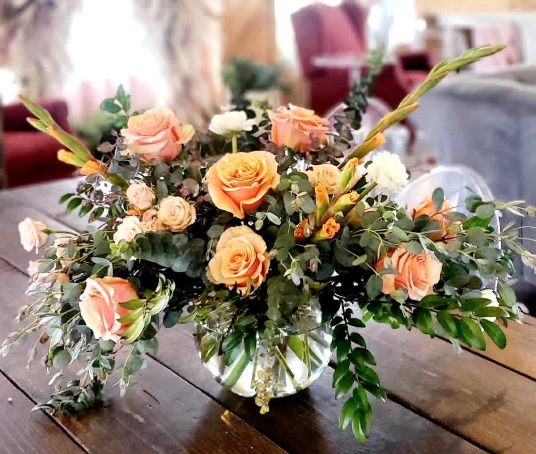 Sugar Sugar - Sugar is a whimsical way to sweeten somebody's day. This beautiful boho arrangement with eucalyptus, peach roses, and white ranunculus in a moon shaped vase elevates any space. Perfect for Women's Day, Mother's Day, or any birthday. APPROXIMATE DIMENSIONS: 22" W x 20" H