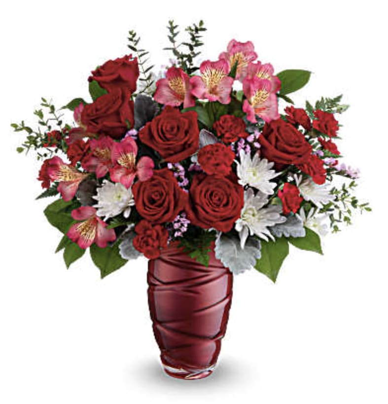 Loving Swirls Bouquet - Honor the beauty of true love with this vibrant Valentine's Day bouquet of red roses, beautifully arranged in pearlescent glass vase with an eye-catching swirling design.