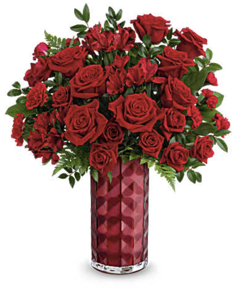 Radiant Charm Bouquet - Absolutely stunning! This striking all-red Valentine's Day bouquet is beautifully arranged in a glass keepsake vase with a contemporary geometric design and a lovely pearlescent finish.