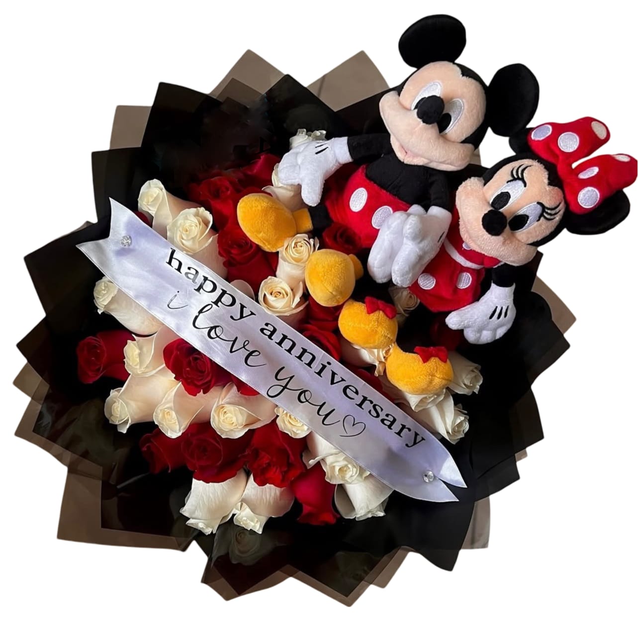 Mickey and Minnie Mouse Bouquet Mickey and Minnie Mouse Bouquet - Red and White roses wrapped in black and red floral wrapping Paper. Mickey and Minnie Plush set included. Ribbon can be removed or customized.