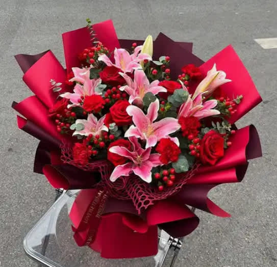 Enchanted Bouquet - This stunning hand bouquet is a gorgeous designed to make someone's day very special.