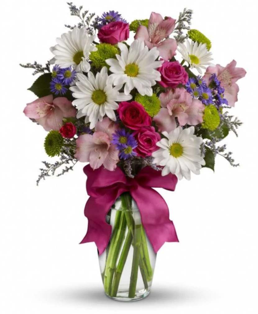 Pretty Please  - Looking for the prettiest bouquet in town? We've got the perfect all-around choice! Pretty Please is a flower bouquet with all the right stuff - a lovely mix of fresh flowers in breezy shades of pink, white, lavender and more at a wonderfully reasonable price, all tied up with a big pink bow. A great way to make someone smile.
