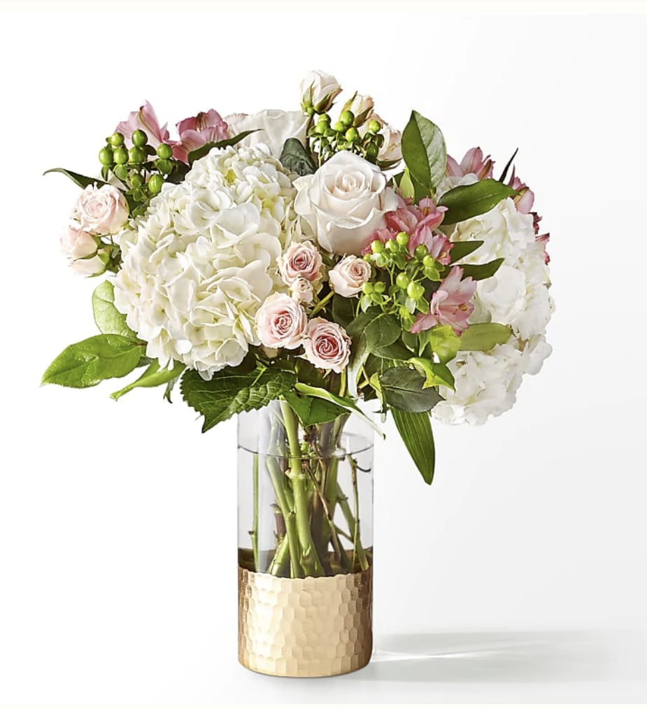Pretty in Pink  - Capturing the essence of a cool spring day, this delicate arrangement is the perfect statement of love, appreciation or admiration.