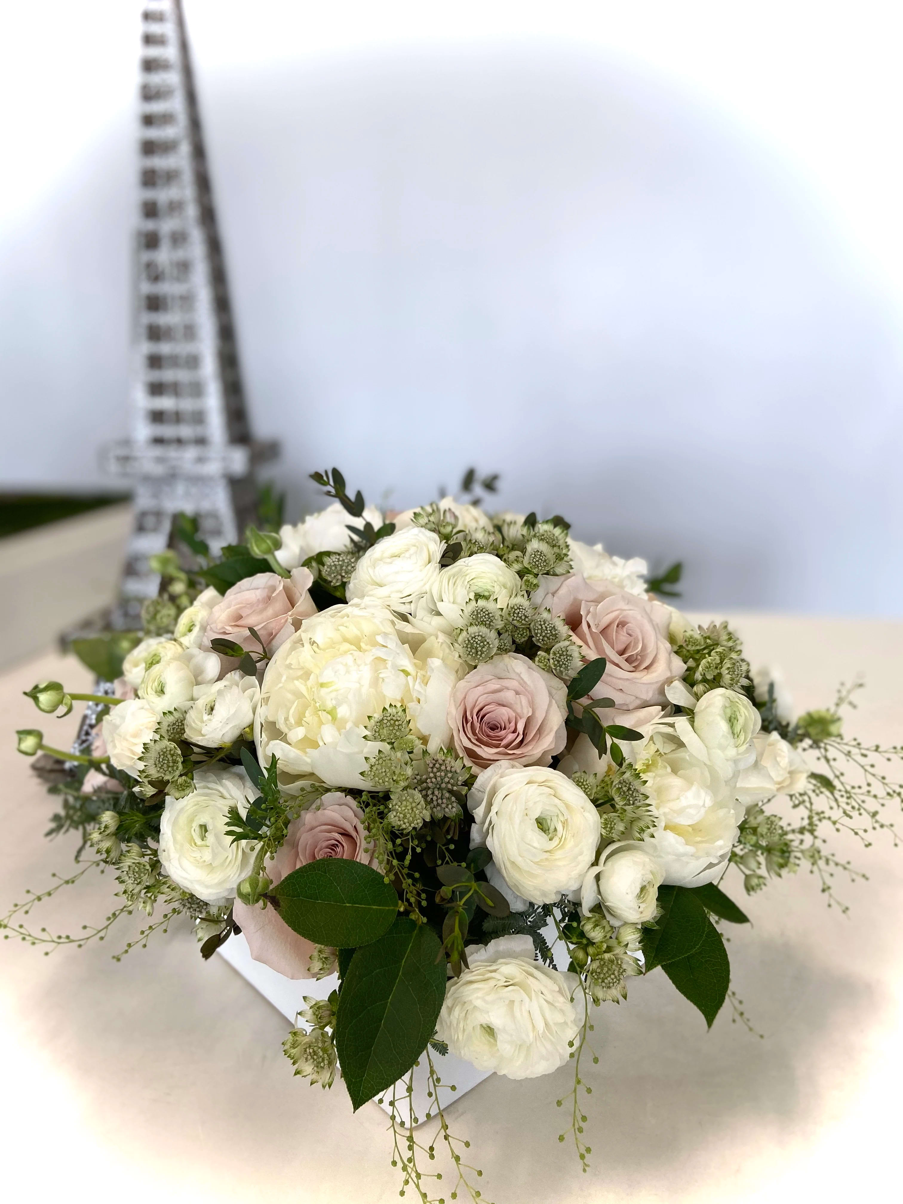 Milady - Sophisticated soft tone arrangement in Square ceramic white vase 8&quot;x8&quot;