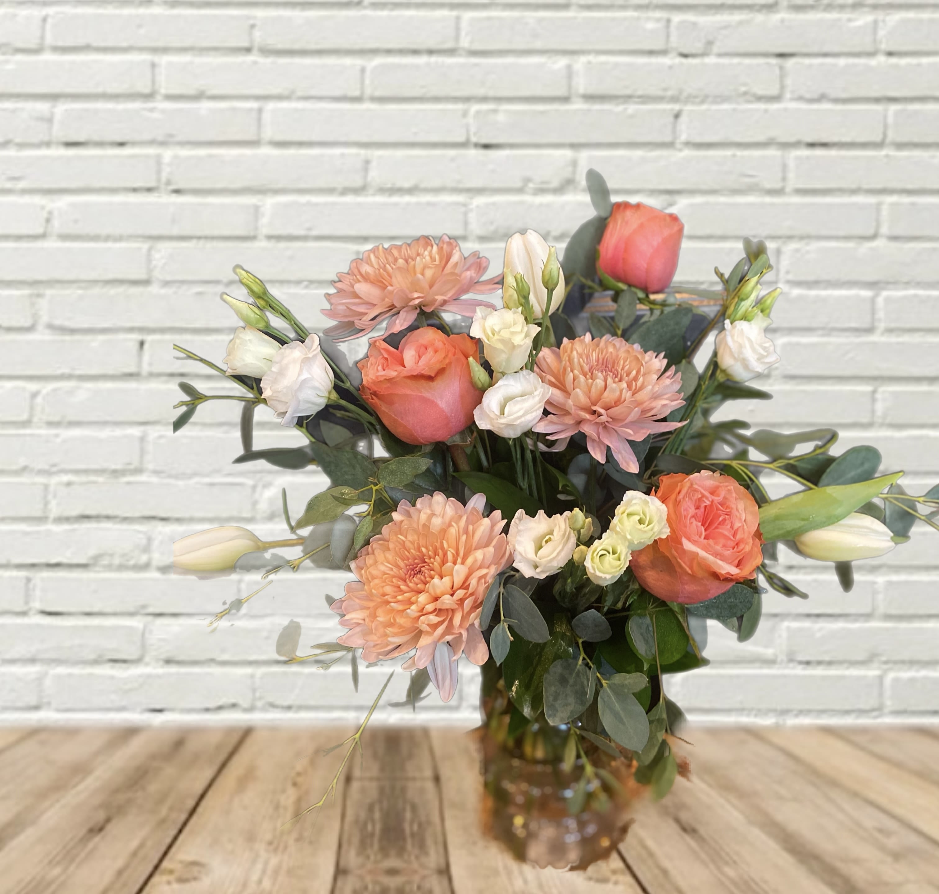Blushing Gem Blushing Gem - Florals in pinks & whites in a pink bubble vase.