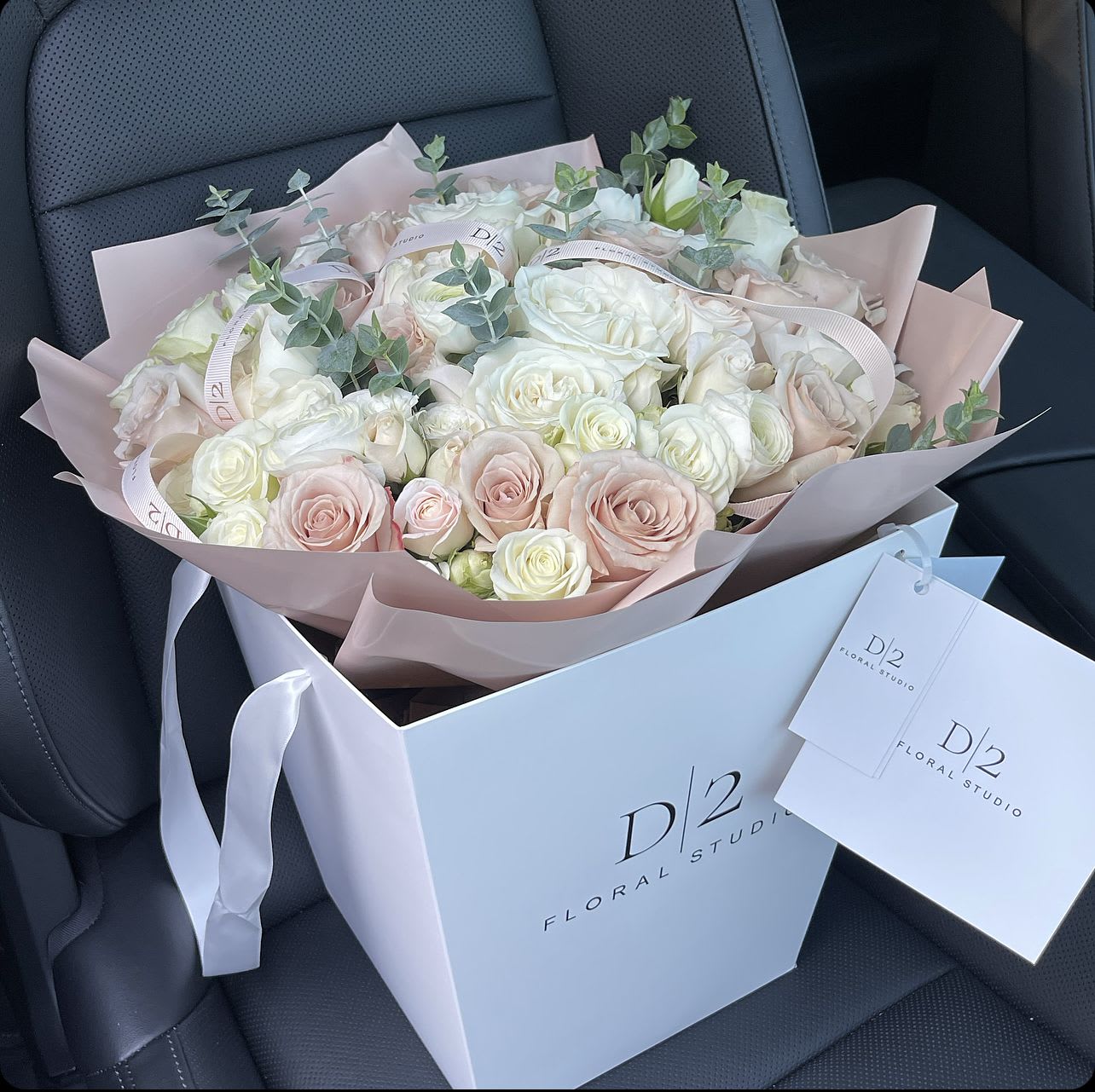 Amanda - Delicate bloom in our branded D|2 bag to brighten up your loved one's day.  ALL OUR BOUQUETS COME WITH WATER BAG AND BRANDED D|2 BAG!!!!!