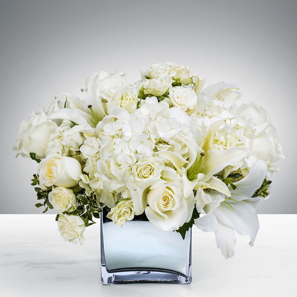 Serenity - Serenity is the state of being calm, peaceful and untroubled.  Express your love, comfort, care or appreciation with this serene bundle of blooms. Happiness included.