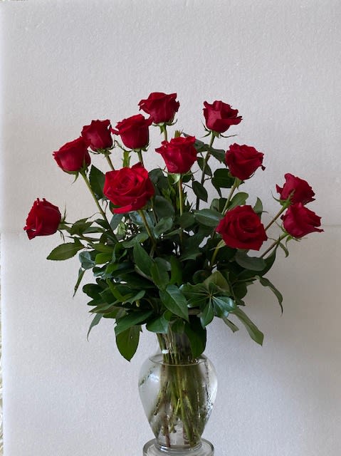 Long Stem Roses Long Stem Roses - These dozen red roses with baby's breath are classic! Perfect romantic gift for Valentine's Day or an Anniversary. APPROXIMATE DIMENSIONS: 25" H X 18" W