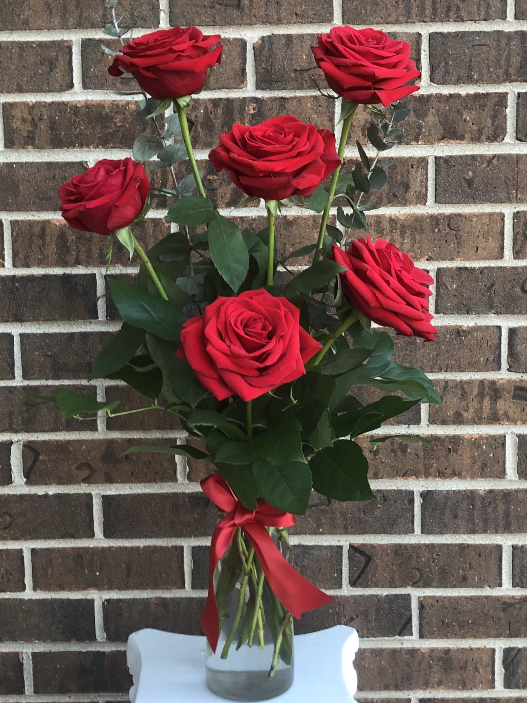 1/2 Dozen Roses in a Vase - Six beautiful roses in a vase with a ribbon.