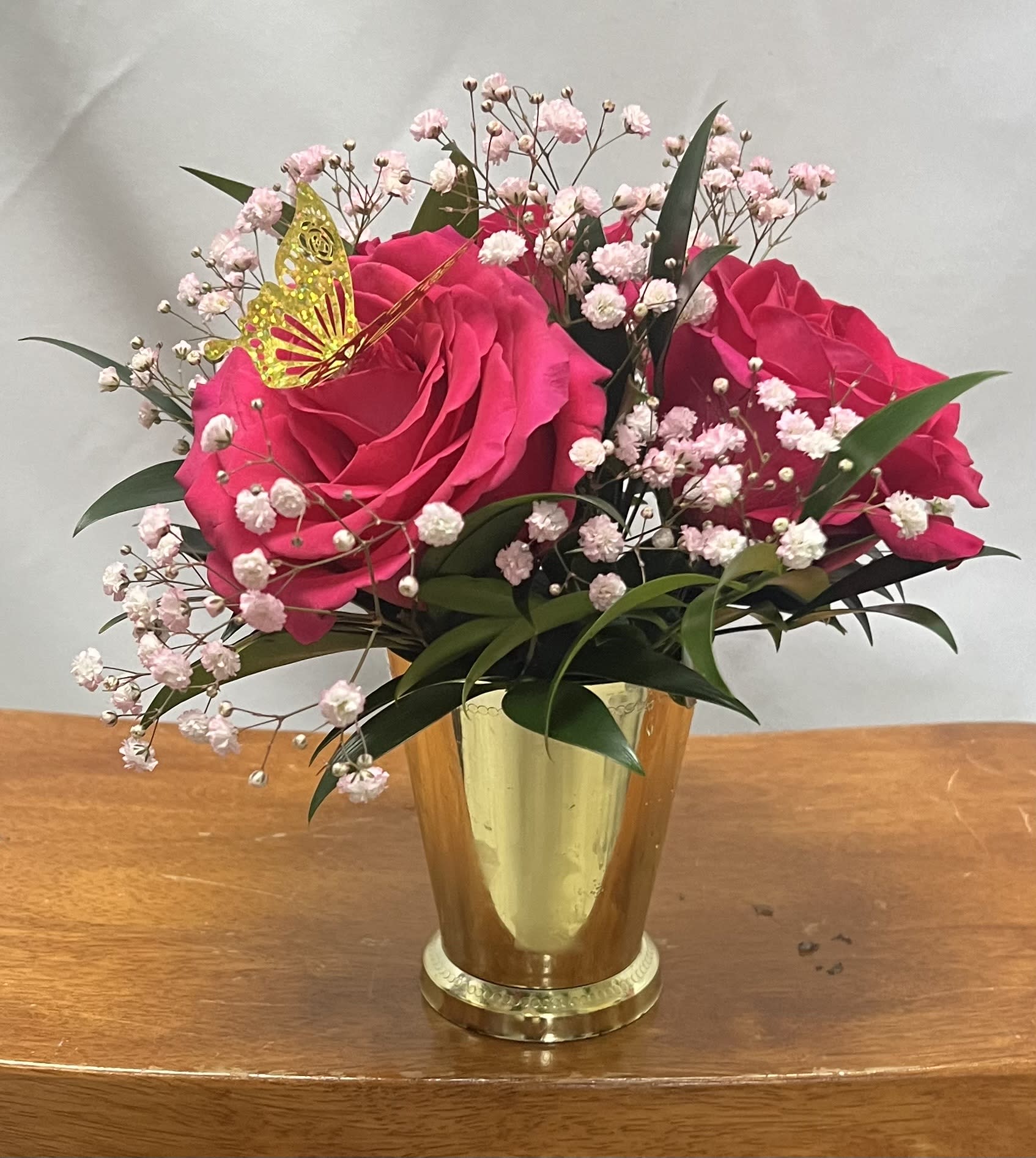 Pink Passion Pink Passion - 3 pink roses , baby's breath , greens , butterfly and gold container