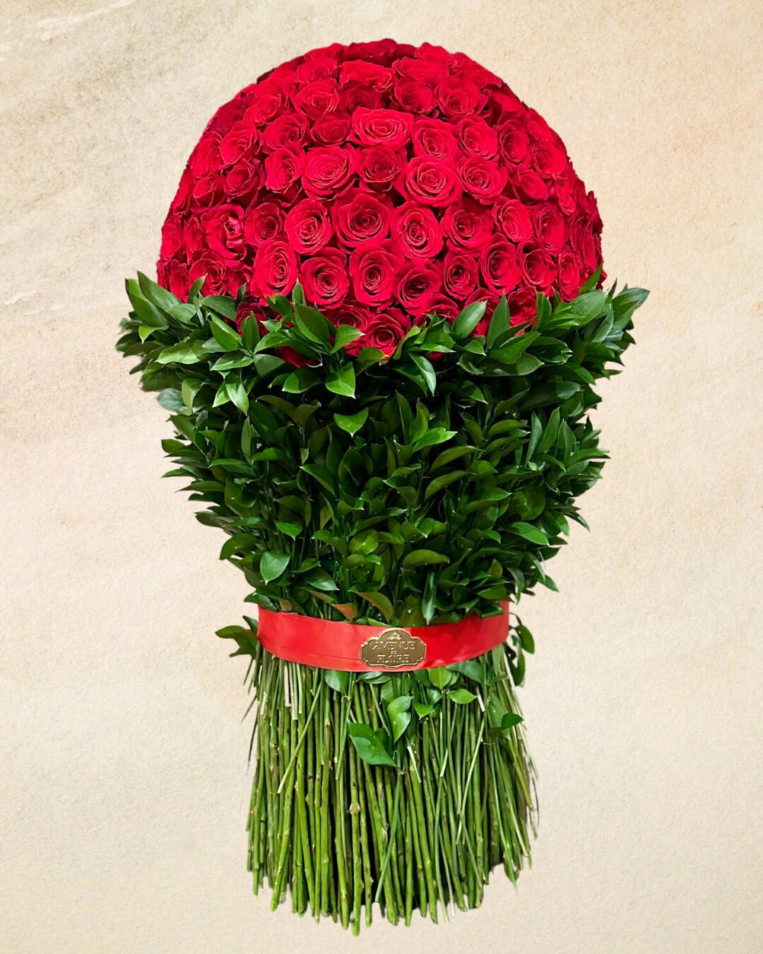 Standing Rose Bouquet Standing Rose Bouquet - Behold the breathtaking opulence of our Standing Rose Bouquet, a grandeur masterpiece standing tall with over 300 roses. This towering bouquet is a spectacle of unparalleled elegance and floral abundance, meticulously crafted to captivate hearts and leave an everlasting impression.