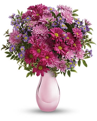 Teleflora's Time Together Bouquet - Simply sweet this charming bouquet of asters and chrysanthemums is accented with a shimmering pink keepsake vase she'll always treasure.