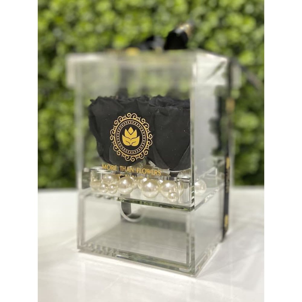 Eternal Roses Acrylic Box (4 Roses) - Black - Eternal Roses Acrylic Box (4 Roses): We stopped the clock for our preserved roses to experience our Eternal Deluxe Collection timelessly. 4 preserved roses decorated in our signature deluxe clear acrylic boxes and completed with a bow and a personalized card message, trendy and fancy. Roses that Last 3 years. *Avoid direct sunlight, dust, water or excessive heat. *Available for Nationwide Shipping (5-7 days shipping time)