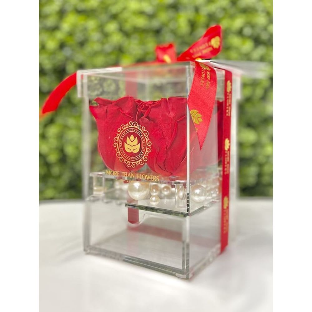 Eternal Roses Acrylic Box (4 Roses) - Red - Eternal Roses Acrylic Box (4 Roses): We stopped the clock for our preserved roses to experience our Eternal Deluxe Collection timelessly. 4 preserved roses decorated in our signature deluxe clear acrylic boxes and completed with a bow and a personalized card message, trendy and fancy. Roses that Last 3 years. *Avoid direct sunlight, dust, water or excessive heat. *Available for Nationwide Shipping (5-7 days shipping time)