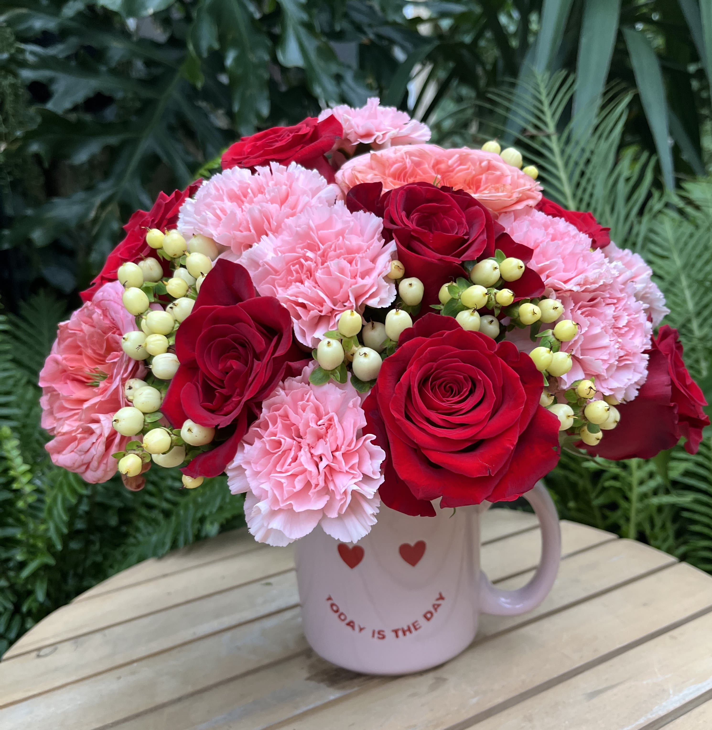 Today - Personally crafted, fresh, seasonal bouquet tastefully arranged in a  4 inch mug. The floral designs shown in the Mugs category illustrate the variety of colors and blossom types possible similar to &quot; I Lome Mom&quot; based on availability. The specific arrangement delivered will be determined by the designer. If you would like to request specific flower types and colors, please place your order in the Custom Arrangements section where you can specify those details or give us a call to discuss your ideas. 