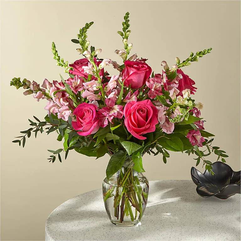Joan Bouquet - Place your Order Online Monday to Saturday before 1:00 p.m. (E.T.) for same-day delivery. “Orders received after hours will be delivered the next business day”. Check our coverage area. Occasionally, flowers and/or container substitutions happen due to weather, seasonality, and market conditions, which may affect availability. If this is the case with the gift you’ve selected, we will ensure that your arrangement's style, theme, and color scheme are preserved and will only substitute items of equal value or higher value.  CARE INSTRUCTIONS Keep the flower arrangement hydrated with natural water and change the water every two days. Do not spray any cleaning product on the flower arrangement. Do not place heavy objects directly on the flower arrangement. Keep flower arrangements out of direct sunlight and extreme heat.