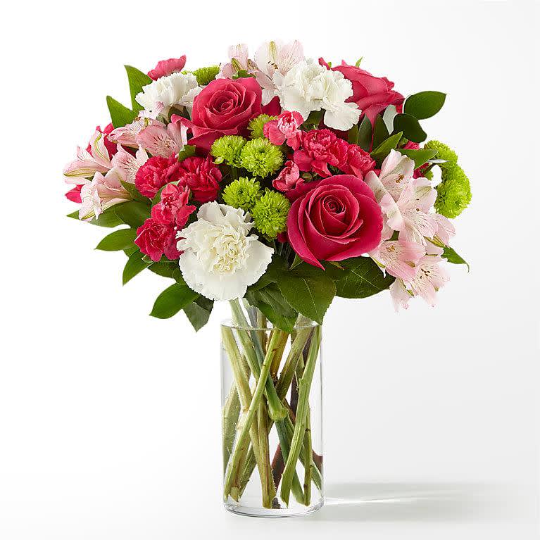 Xena Bouquet - An array of hot pink roses, pale pink alstroemeria, and more are set in a glass cylinder vase, making a wonderful gift to light up the face of its recipient.  Place your Order Online Monday to Saturday before 1:00 p.m. (E.T.) for same-day delivery. “Orders received after hours will be delivered the next business day”. Check our coverage area. Occasionally, substitutions of flowers and/or containers happen due to weather, seasonality, and market conditions which may affect availability. If this is the case with the gift you’ve selected, we will ensure that the style, theme, and color scheme of your arrangement are preserved and will only substitute items of equal value or higher value.   CARE INSTRUCTIONS Keep the flower arrangement hydrated with natural water and change the water every two days. Do not spray any cleaning product on the flower arrangement. Do not place heavy objects directly on the flower arrangement. Keep flower arrangements out of direct sunlight and extreme heat.