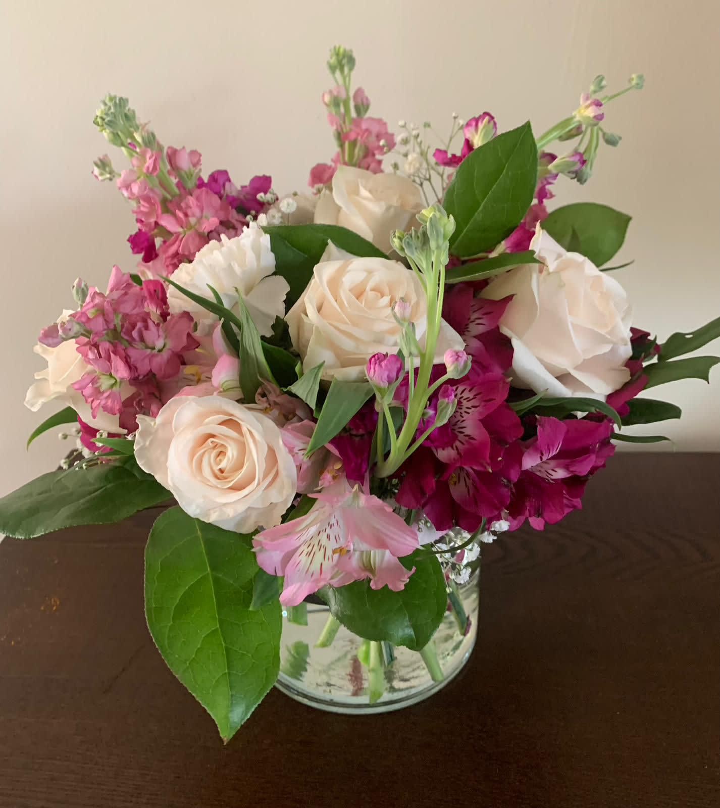 Violet Bouquet - Luxurious floral arrangements with 100% real and fresh flowers make this arrangement a true symbol of luxury for any occasion. All Occasion Place your Order Online Monday to Saturday before 1:00 p.m. (E.T.) for same-day delivery.  “Orders received after hours will be delivered the next business day”. Check our coverage area. Occasionally, flowers and/or container substitutions happen due to weather, seasonality, and market conditions, which may affect availability. If this is the case with the gift you’ve selected, we will ensure that your arrangement's style, theme, and color scheme are preserved and will only substitute items of equal value or higher value.  CARE INSTRUCTIONS  Keep the flower arrangement hydrated with natural water and change the water every two days. Do not spray any cleaning product on the flower arrangement. Do not place heavy objects directly on the flower arrangement. Keep flower arrangements out of direct sunlight and extreme heat.