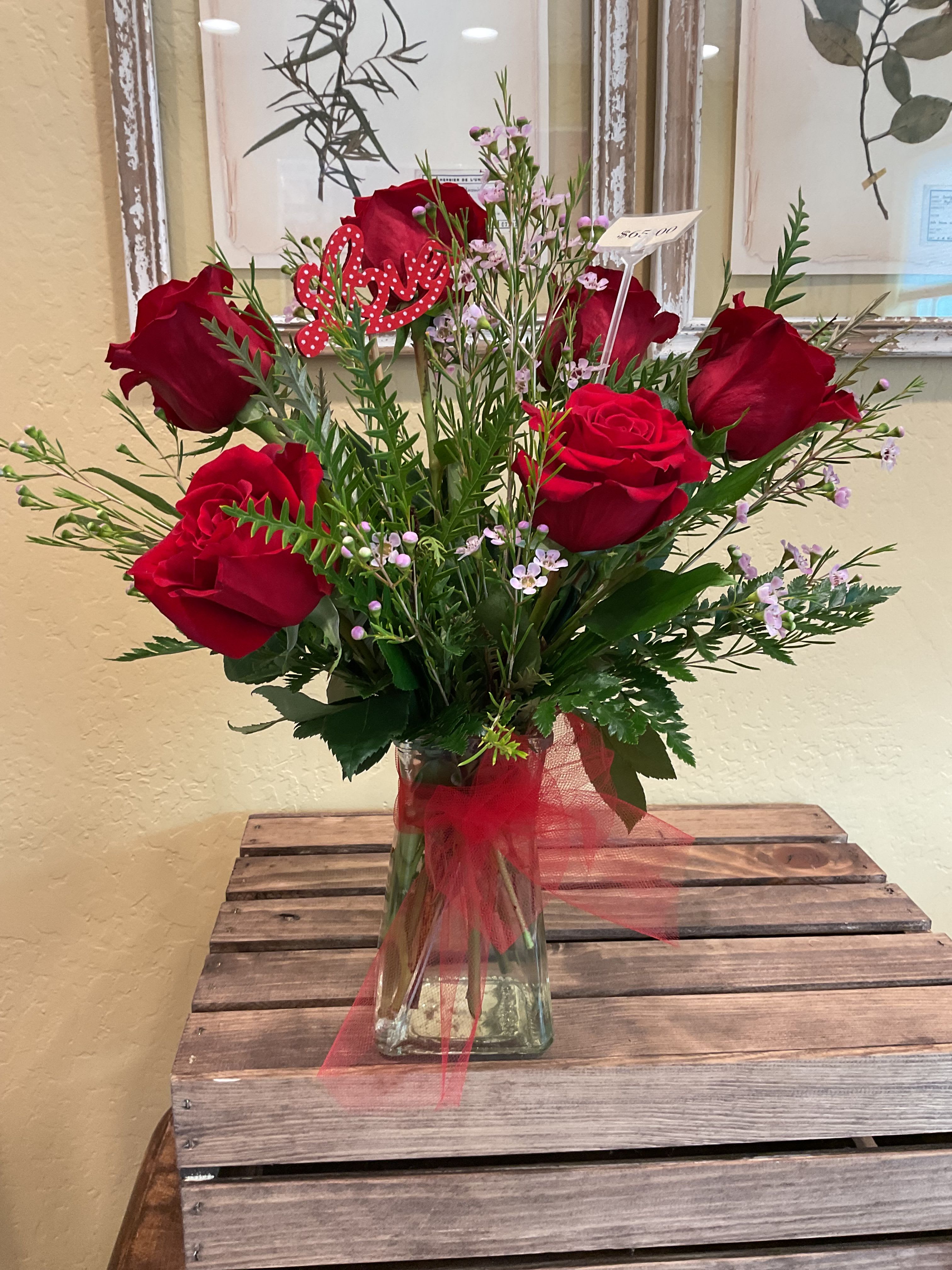 1/2 Dozen Roses 1/2 Dozen Roses - Please specify what color of roses you would like they will be arranged in a vase with gorgeous fillers and miscellaneous greens. Perfect for any occasion.