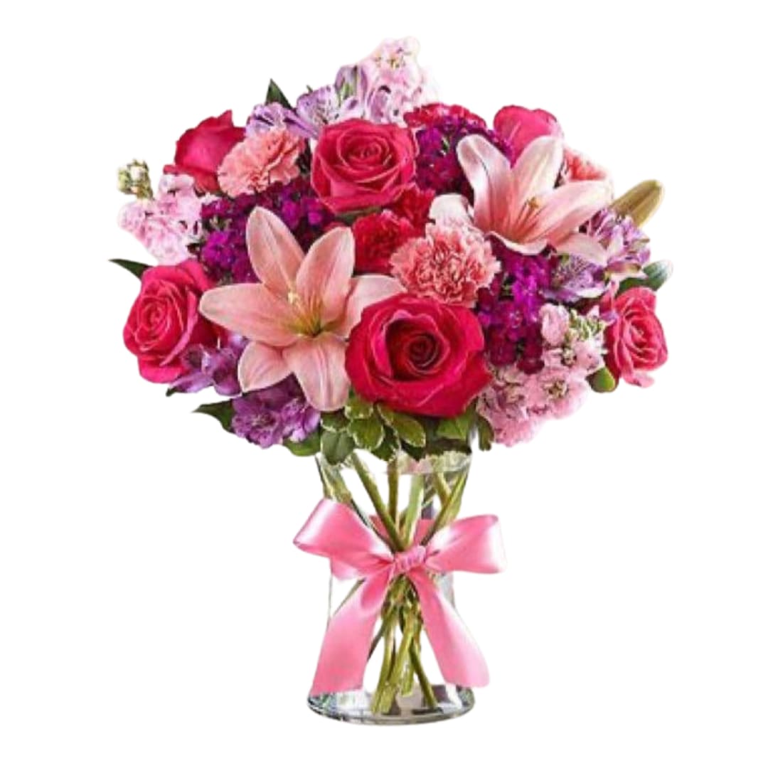 Sweetheart Bouquet  - A beautiful pink color tone bouquet. Send this to your loved ones and they will fall in love!   Includes: Roses, Lilies, Spar Roses, Alstroemeria, Ribbon, Glass vase. Picture is a Standard.