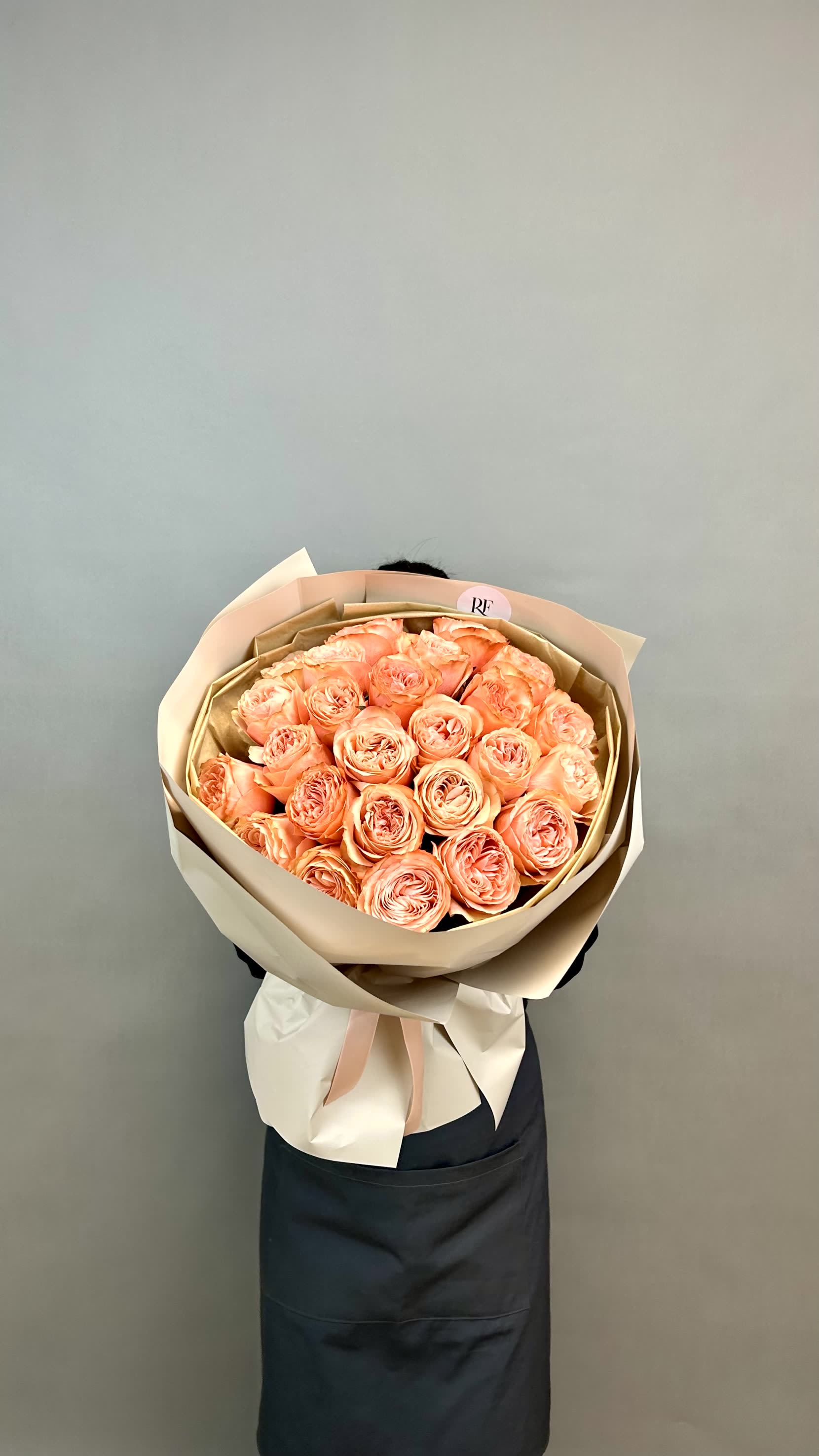Candy Luxe - A sumptuous mono bouquet of Candy Expression peony-type roses, radiating elegance and bold allure. 