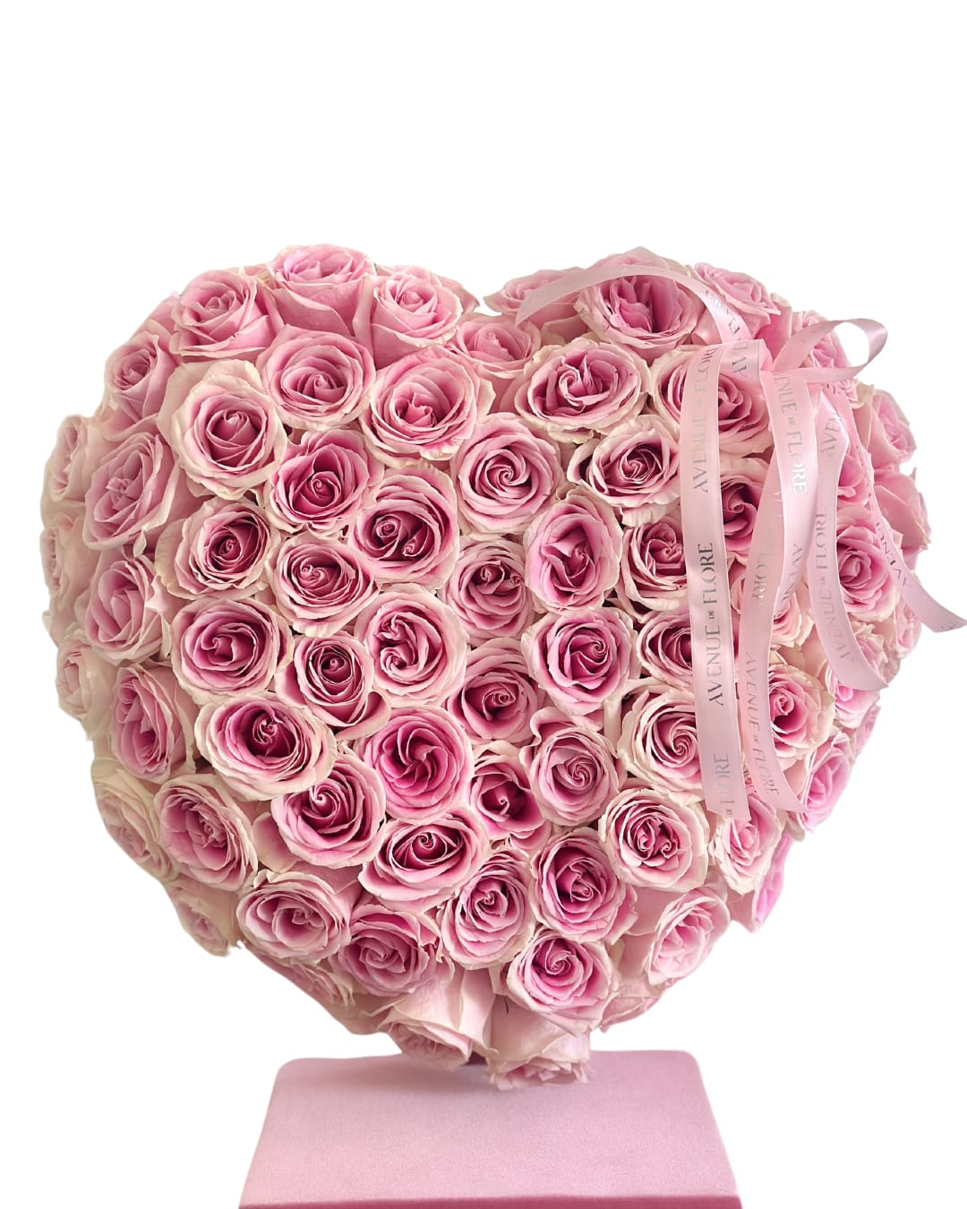 PINK STANDING HEART - Make a grand declaration of love for Valentine's Day with this spectacular standing heart that captures the essence of romance and devotion. This arrangement is not just a gift—it's a heartfelt declaration that transcends words and symbolizes the magnitude of your love.  The size featured in the original image is the standard option. 