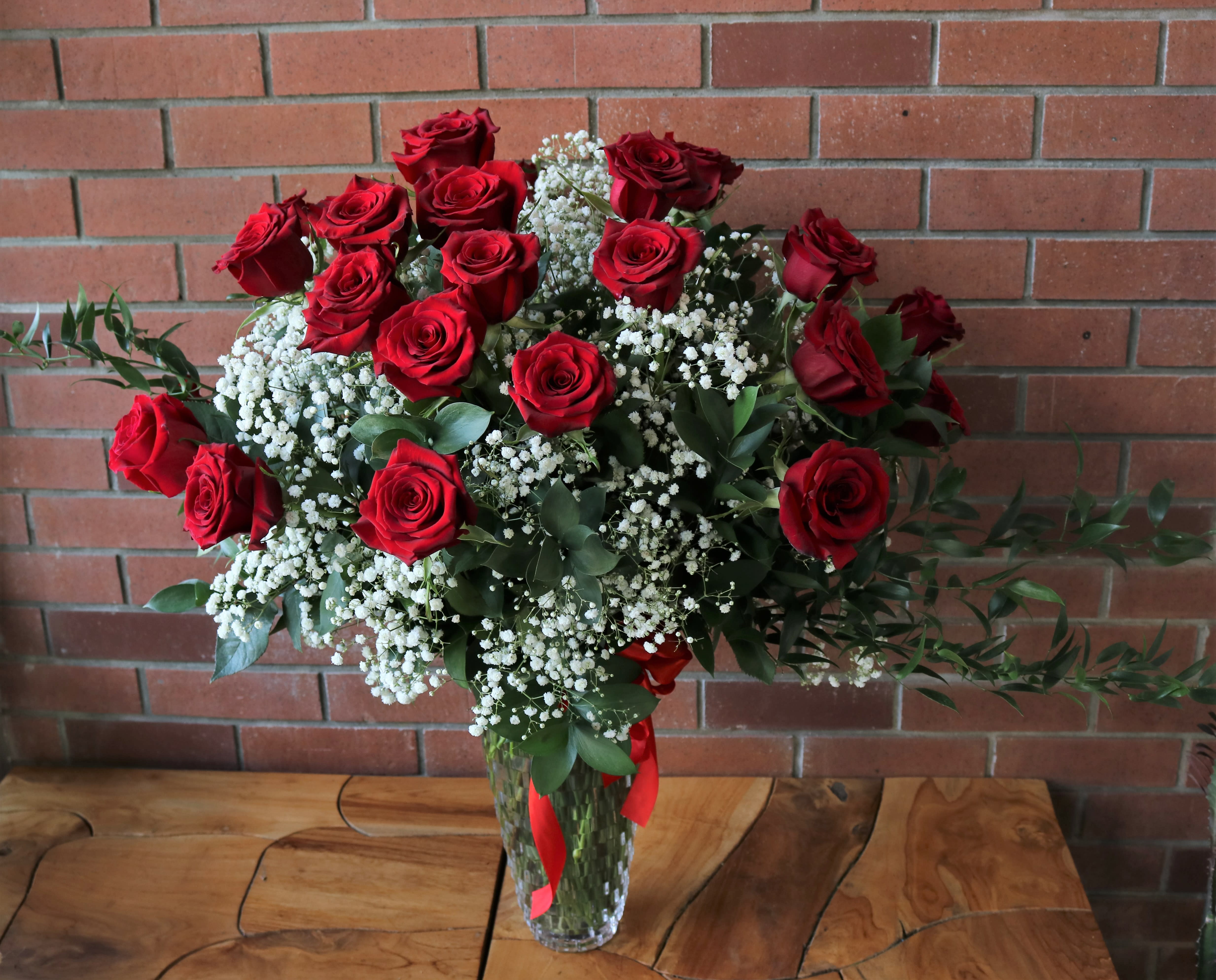 Classy Rose Surprise In Cut Glass Vase  - A large wonderful classy show of affection for the person you love most! 24 Red Roses Premium Long Stem  36 Red Long Stem Roses 48 Red Long Stem Roses 