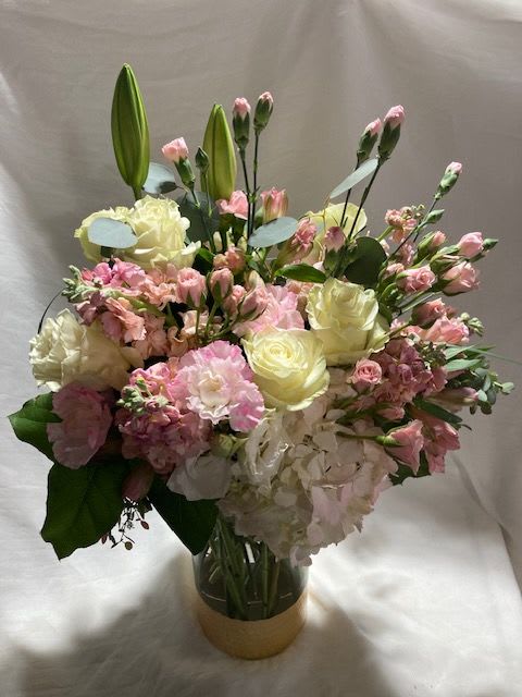 Celebration in pink - Pink is such a popular color and brings recipients a sense of joy and happiness.  This lavish bouquet of beautiful blooms in pink and white is the perfect celebration companion.  