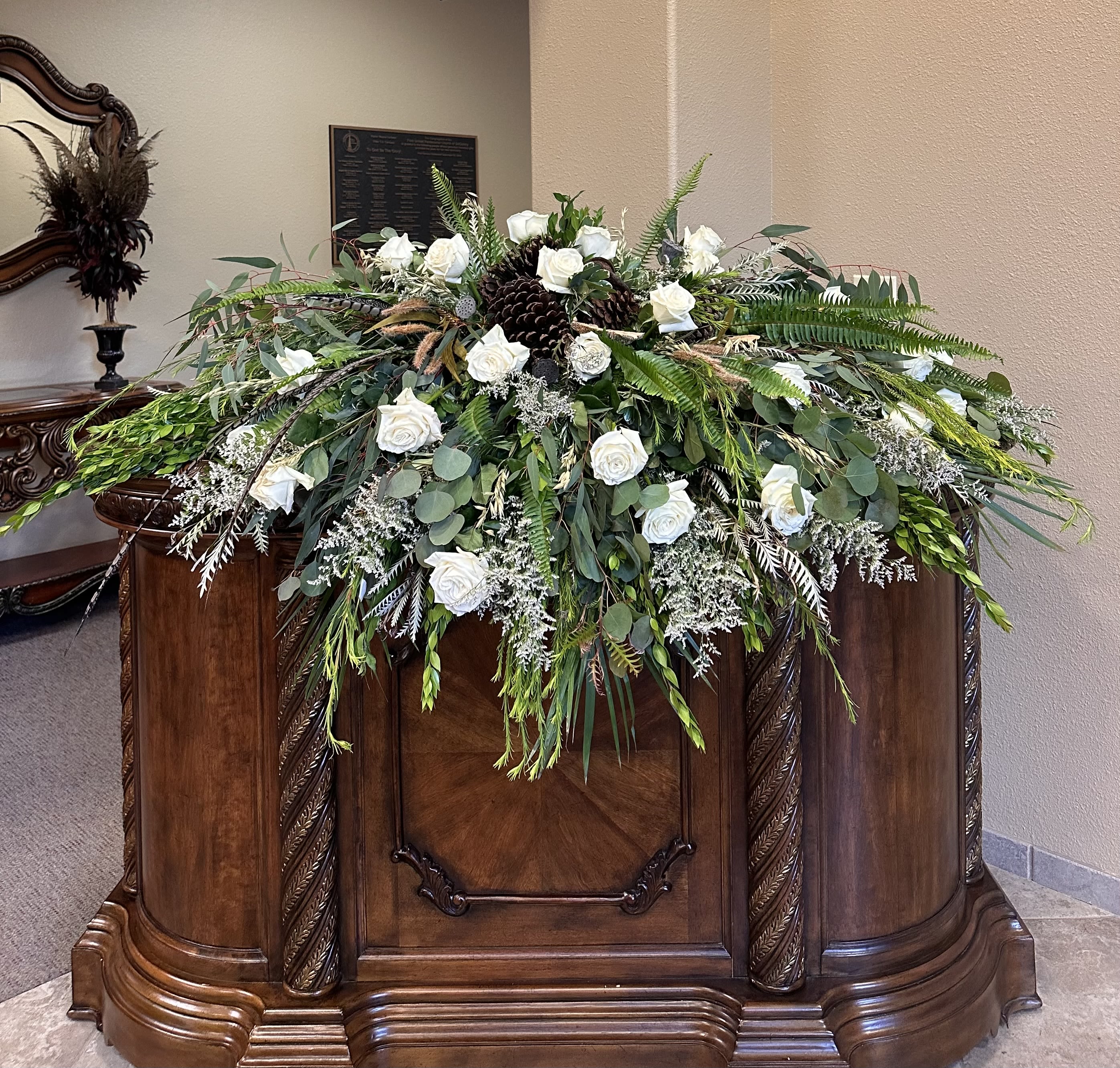 A walk through the woods casket spray  - Feathers are upon request for an additional fee. 